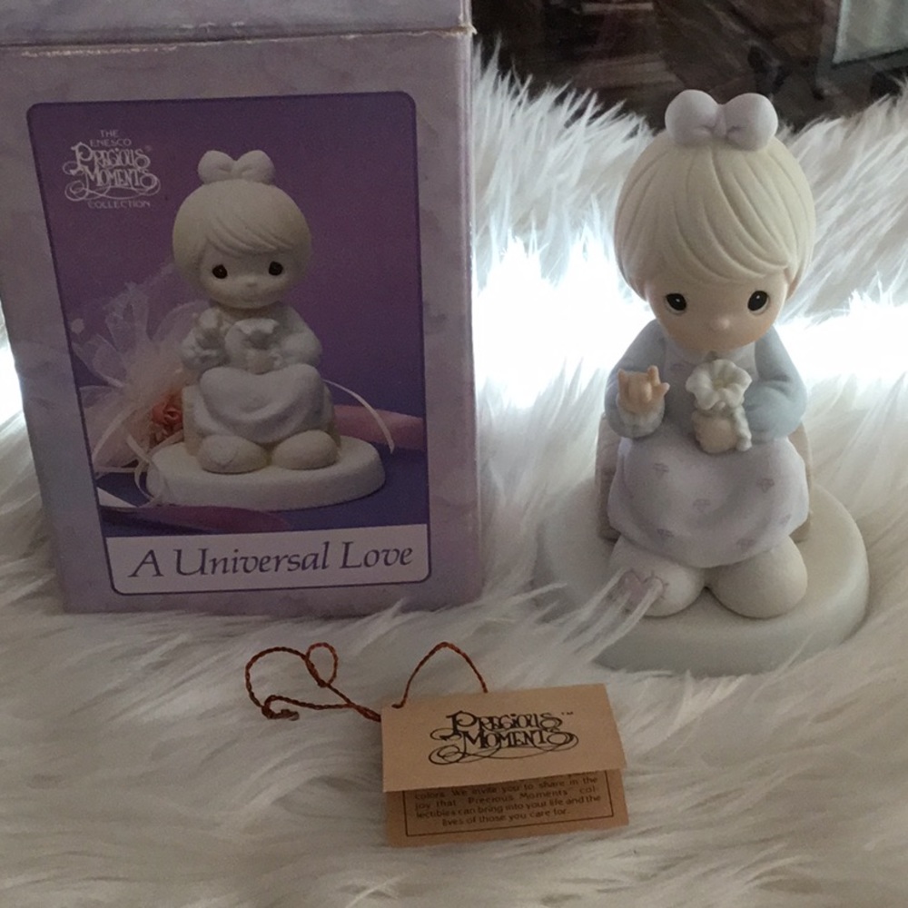 Precious Moments Figurine in White and Light Blue - "A Universal Love"